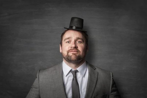 Grappige zakenman dragen van een hoed cilinder — Stockfoto