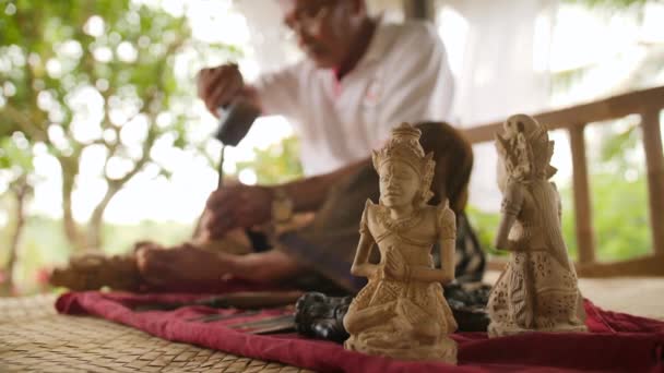 Woodcarver Doing Carving with Sharp Tools on Wooden Workpiece. Traditional Balinese Statuette Making Process. 4K. Bali, Indonesia. — Stock Video