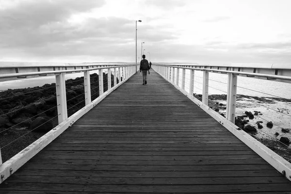 Monochrome Black White Young Male Walking Wooden Jetty Sunrise His — Stock Photo, Image