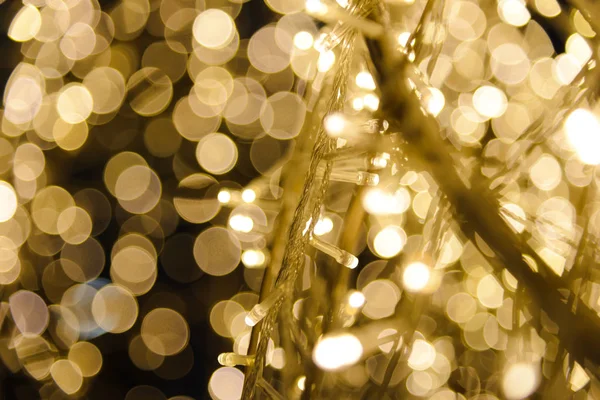 Close up de Natal LED luzes quentes com luzes bokeh no fundo, espaço de cópia — Fotografia de Stock