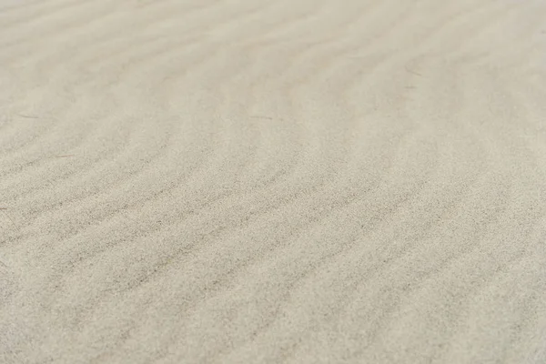 Abstrakte Textur Linie Wellen Sand am Strand - Natur Hintergrund — Stockfoto