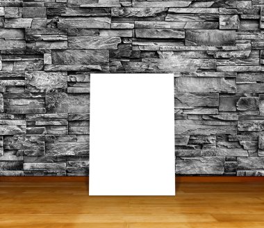 Tabelanın üzerinde granit duvarla kaplanmış bir poster var. Reklam ya da halkla ilişkiler için kağıda metin yaz