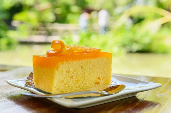 Piece Orange Cake Fresh Orange Slice Top Spoon White Dish — Stock Photo, Image