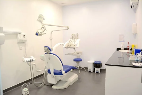 Modern dental practice. Dental chair and other accessories.