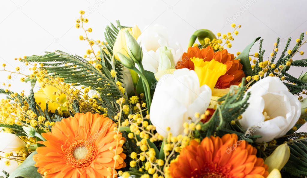 Colorful spring flowers bouquet. Narcissus, gerbera, tulip