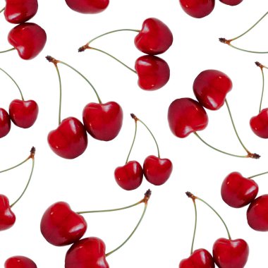 Yeşil saplı parlak kırmızı kirazlar sade beyaz bir zemine saçılmış..