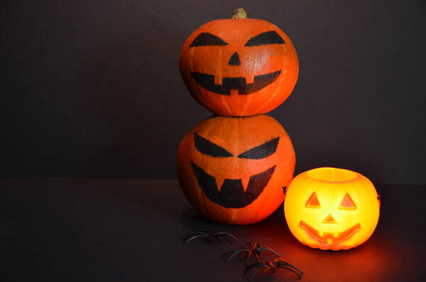 Halloween pumpkin and lantern on black.