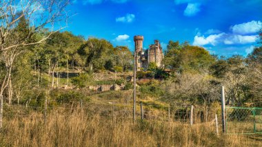 Castle in Paraguay overlooking the Ybytyruzu Mountains. clipart