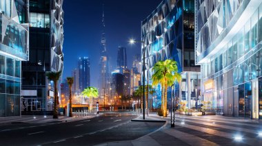 Güzel görünümüne Dubai şehir şehir merkezi manzarası tasarım bölgesine gece, Birleşik Arap Emirlikleri
