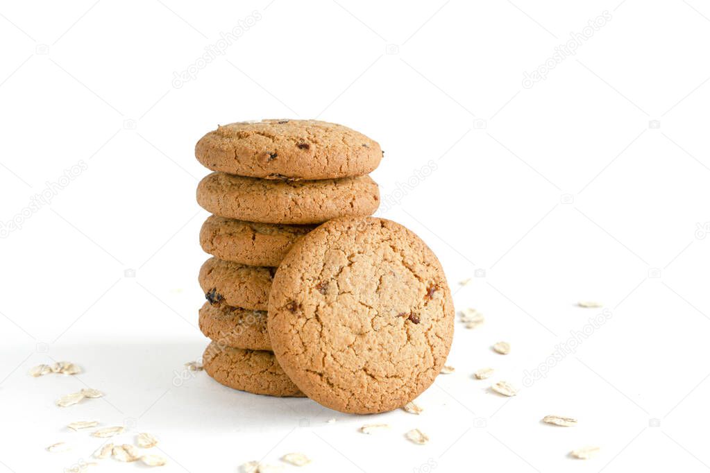 Crispy oatmeal cookies isolated on white background. Homemade Cookie Festival. View from above.