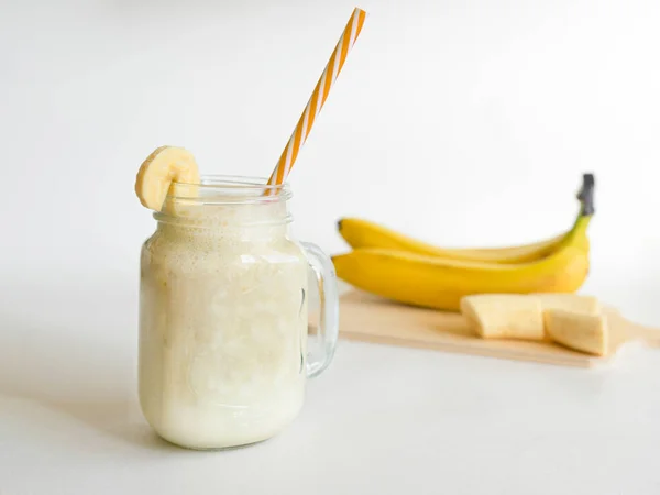 Fresh Banana Smoothie Glass Jar Straw Bananas Light Background Healthy — Stock Photo, Image