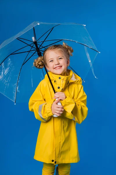 Menina Alegre Uma Capa Chuva Botas Borracha Sobre Fundo Azul — Fotografia de Stock