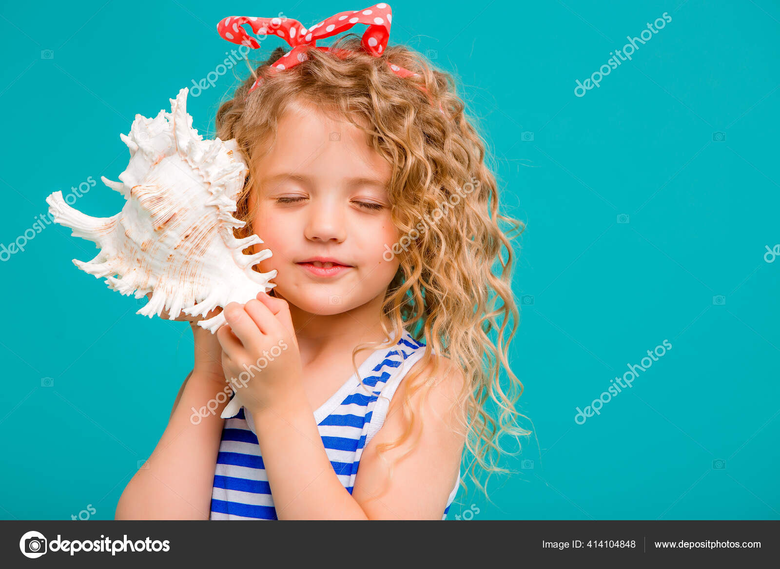 Little Girl Holding Sea Shell Studio Stock Photo by ©Krisfotostav 414104848