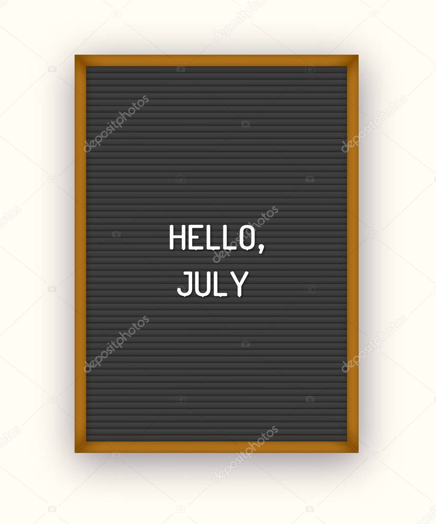 Hello July motivation quote on black letterboard white plastic letters