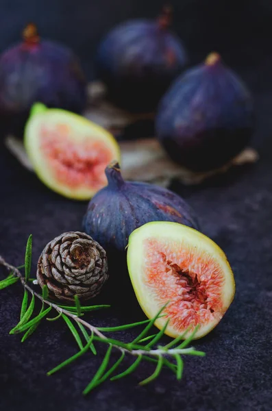 Fresh figs on a dark background on a table