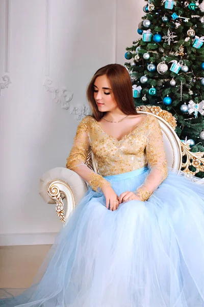 Young Beautiful Woman Long Party Dress Sitting Christmas Tree Studio — Stock Photo, Image