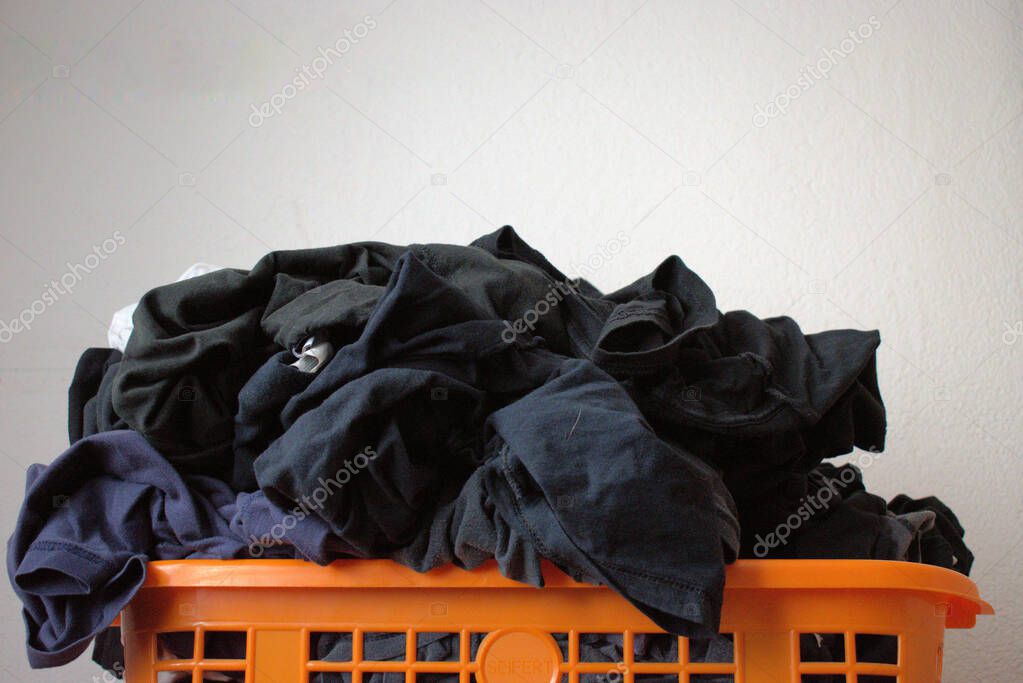 Dirty T-Shirts in a basket are ready to get washed in Vaduz in Liechtenstein 11.6.2020
