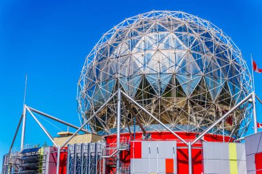Modern architecture and spherical look of the science center in Vancouver is reflective of learning activities and Science experiments in Vancouver.BC clipart