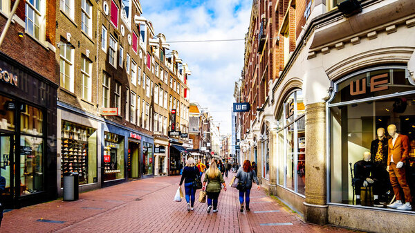 Amsterdam, Noord Holland/the Netherlands - Oct. 3 2018: The Kalverstraat, a famous shopping street in the center of the old city of Amsterdam
