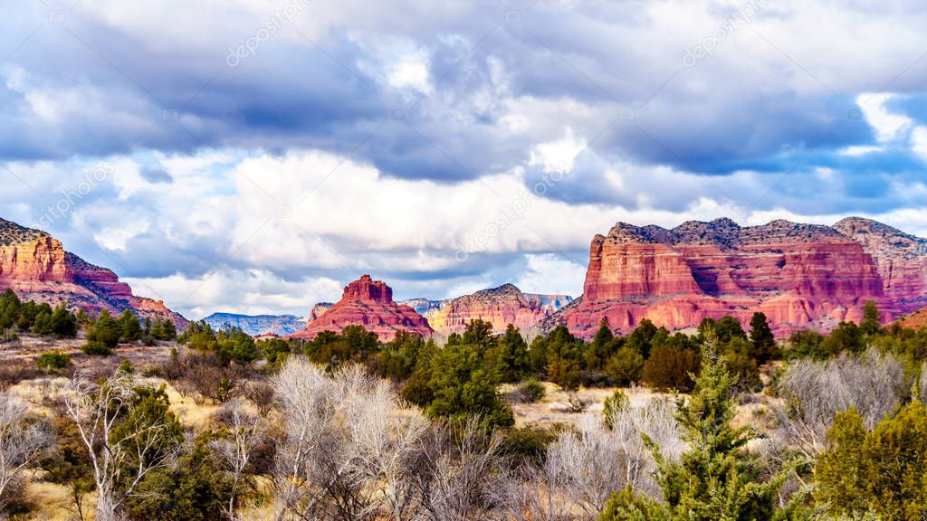 The Red Rock Mountains around the city of Sedona in Northern Arizona in Coconino National Forest in the United States. From left to right: Cathedral Rock, Bell Rock, Courthouse Butte 
