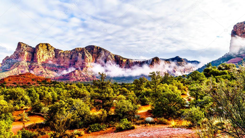 Lee Mountain and other red rock mountains surrounding the town of Sedona in northern Arizona in Coconino National Forest, United States of America