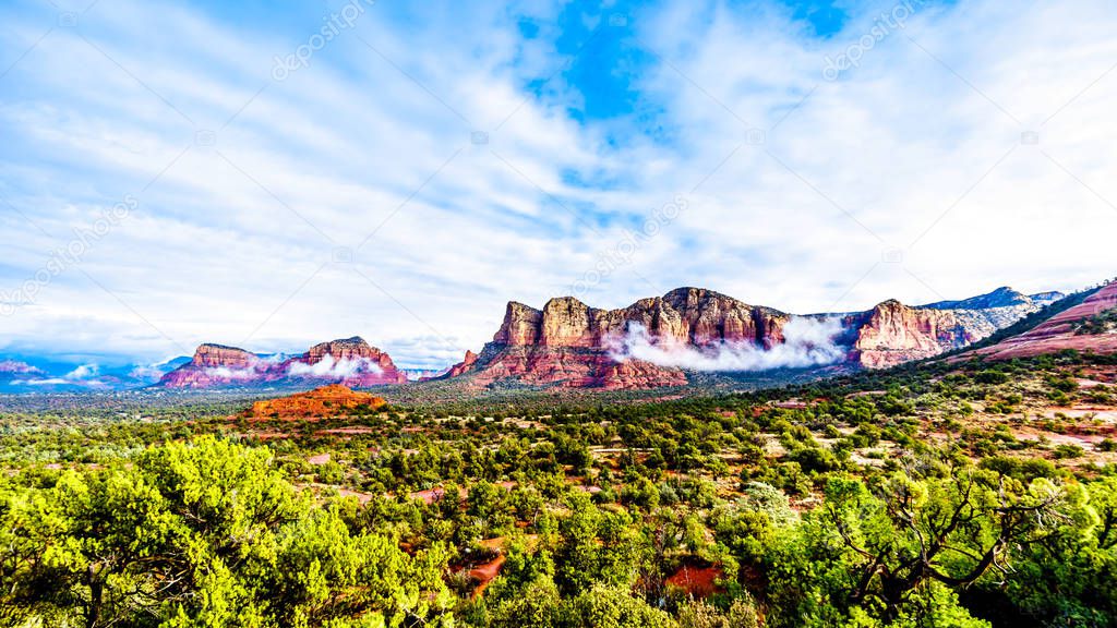 Twin Buttes, Lee Mountain, Munds Mountain and other red rock mountains surrounding the town of Sedona in northern Arizona in Coconino National Forest, United States of America