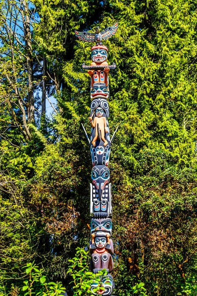 The \'Ga\'akstalas Totem Pole\' is one of the most colorful and intricately carved totem poles located in Stanley Park, Vancouver, Canada
