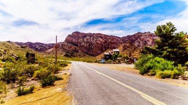 El Dorado Canyon, Nevada/USA - June 10 2019: Highway SR165 runs through the old mining town of El Dorado in the El Dorado Canyon in the Nevada Desert clipart