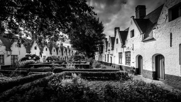 Black and White Photo of the \'Princely Beguinage Ten Wijngaarde\' with its white-coloured house fronts and tranquil convent garden founded in 1245