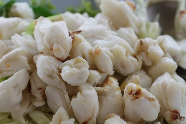 Full plate of fresh crab meat of boiled stone Crab decorated with vegetable side dish, Cheliped of the crab, prepared raw shell animal at homemade gourmet restaurant, food stylist menu backgrounds