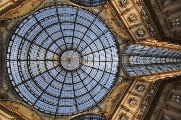 Symmetry sun light roof top above the Marvellous interior decoration design of The Galleria Vittorio Emanuele II in Milan, Italy, The oldest shopping mall of Milan. Travel destination backgrounds