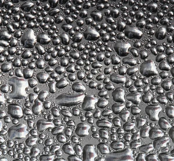 Water Drops Realistic Rain drop Condensation Texture on glossy platinum steel metal, advertisement board design backgrounds
