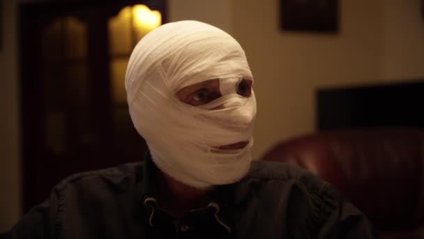 Man Who Changed His Appearance Bandage His Head — Stock Video