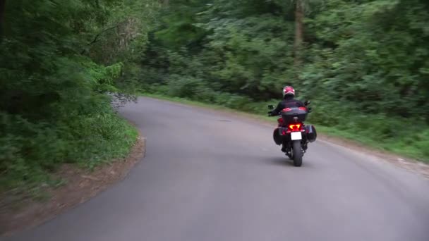 Young Biker Riding Motorcycle Country Road Steady Gimbal Shot — Stock Video