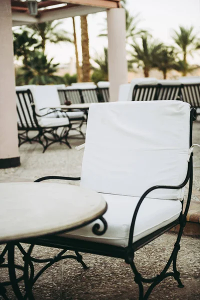 Beautiful white chair and table — Stock Photo, Image