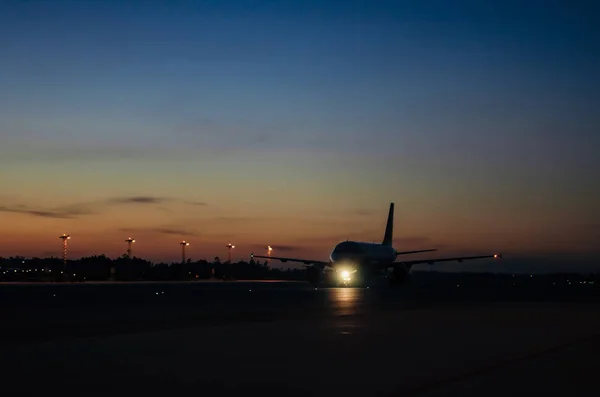 Big Aircraft in airport while sunrise ready to fly — Stock Photo, Image