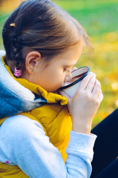 Child Girl Drinking Chocolate Cup Dressed Warm Yellow Vest Autumn — Stock Photo, Image
