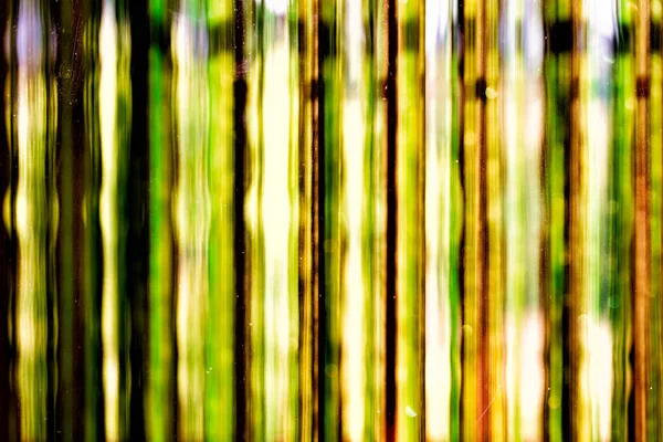 Abstract background - greenish strings behind the glass — Stock Photo, Image