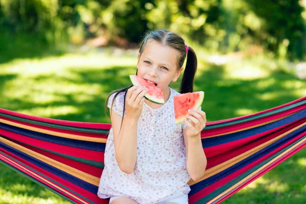 Little Girl Eating Watermelon Slices Garden Sitting Hammock — Stock Photo, Image