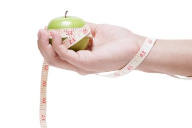 yeşil elma bağlama teyp yandan ölçme ile beyaz zemin üzerine, diyet kavramı izole