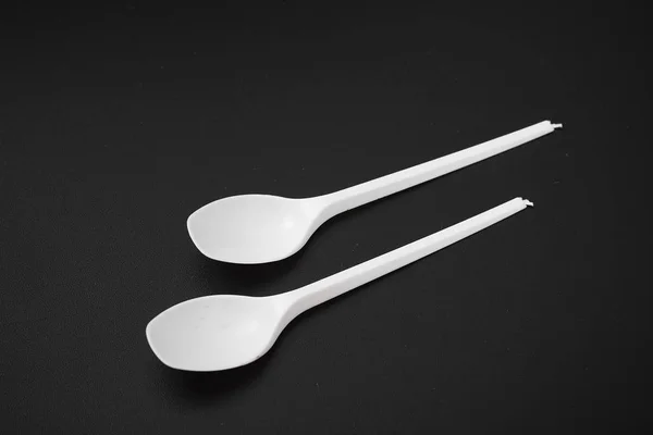 Disposable Plastic Kitchenware Black Background Spoons — Stock Photo, Image