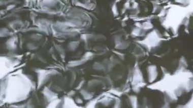 Dalgaların, daireler su. küçük soyut su hareketleri.