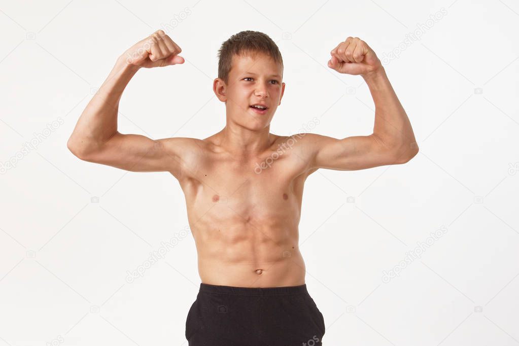 teenager with muscles. emotions of the winner