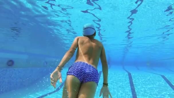 Teenager Swims Pool Water — Stock Video