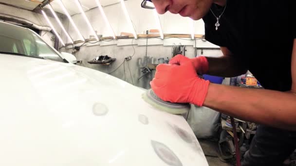 Young Man Repairs Cars Garage — Stock Video