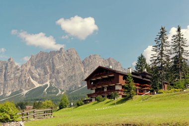 Beluno, Italy-August 9, 2018: The mountain village of Cortina di Ampezzo clipart