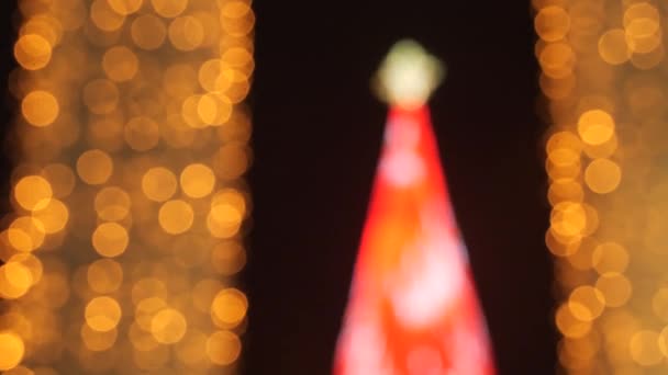 Bunte Running Bokeh Lichter in der Silvesternacht. — Stockvideo