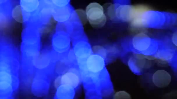 Bunte Running Bokeh Lichter in der Silvesternacht. — Stockvideo