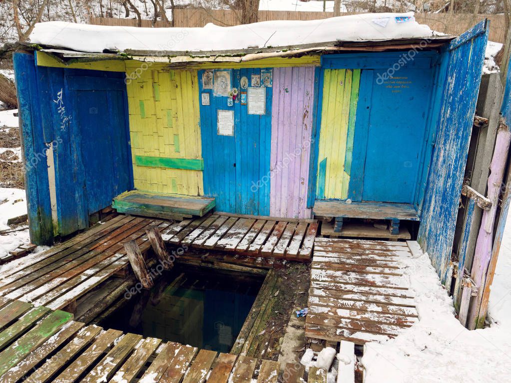 GOMEL, BELARUS - FEBRUARY 10, 2019: holy spring water source with font