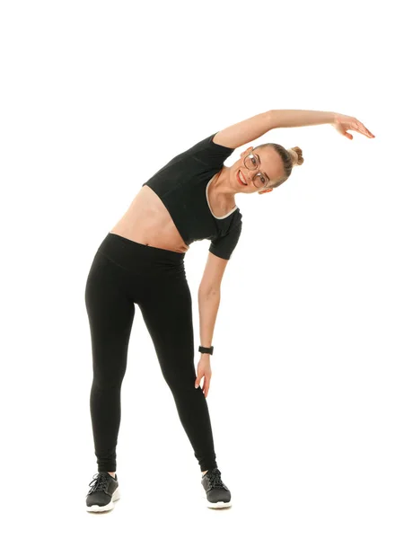 Chica haciendo fitness sobre un fondo blanco . —  Fotos de Stock